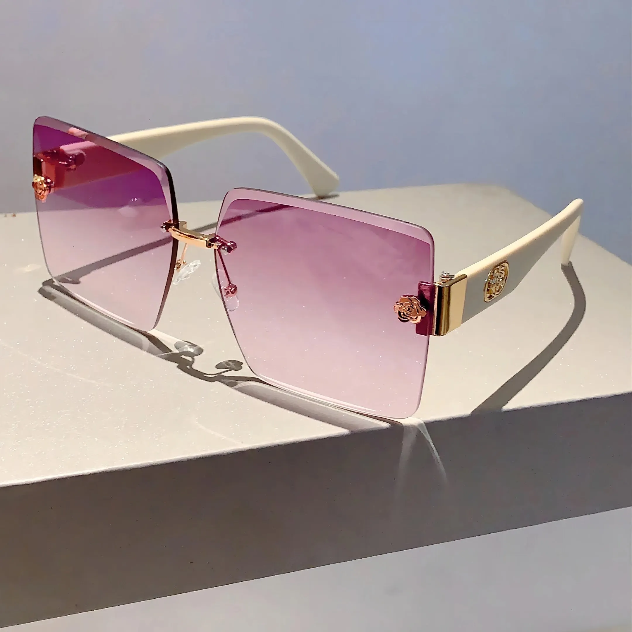 Sunset Glimmer Rimless Sunglasses