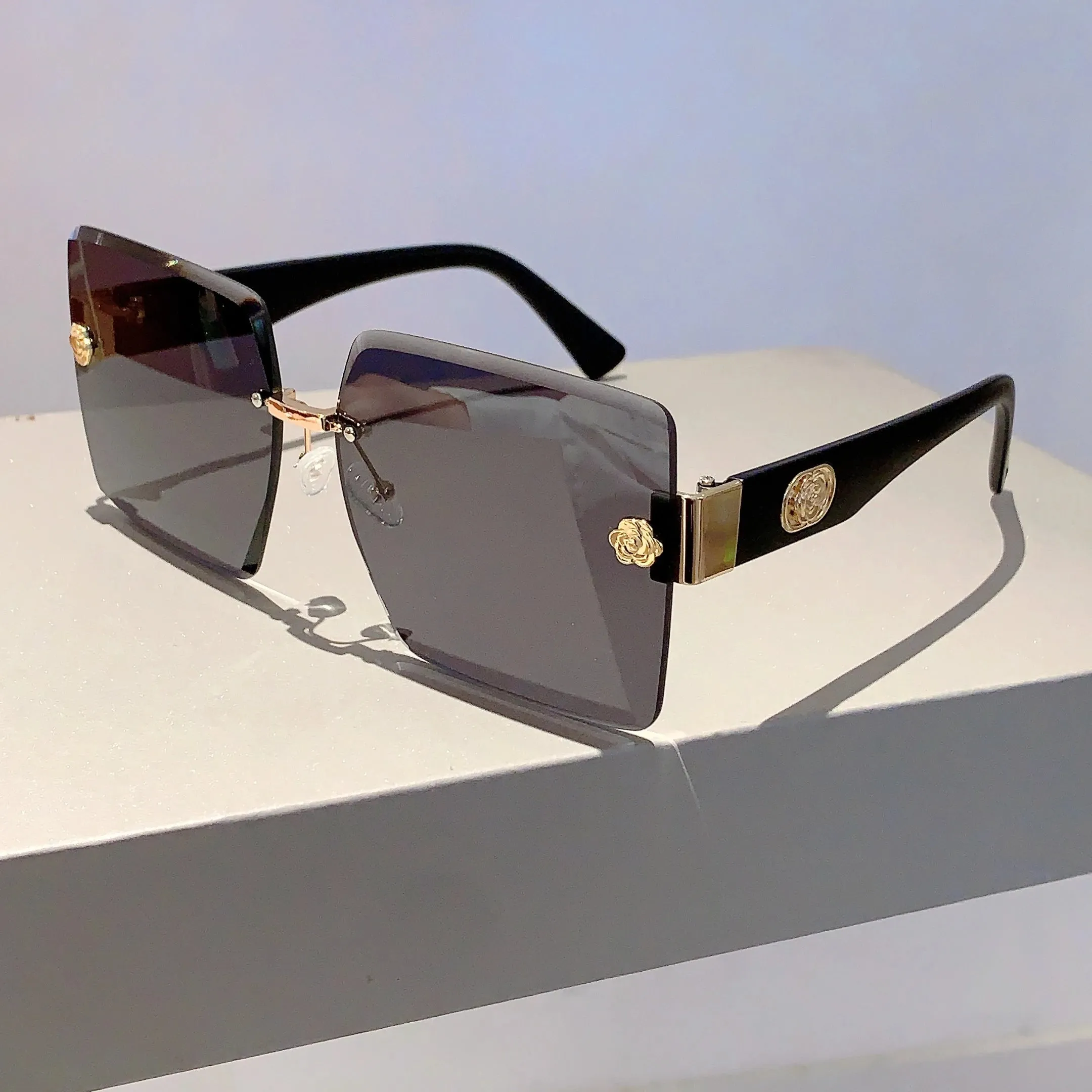 Sunset Glimmer Rimless Sunglasses