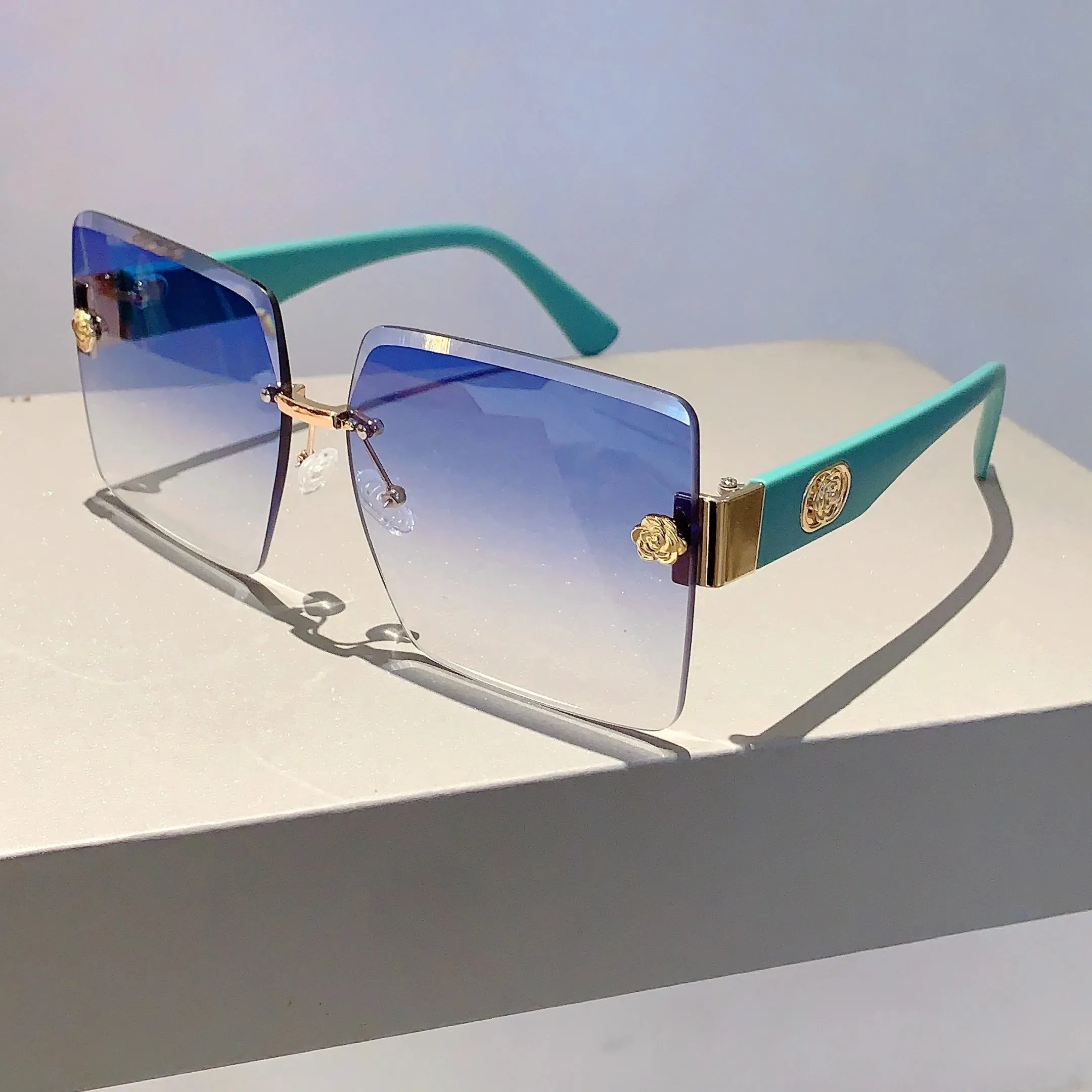 Sunset Glimmer Rimless Sunglasses