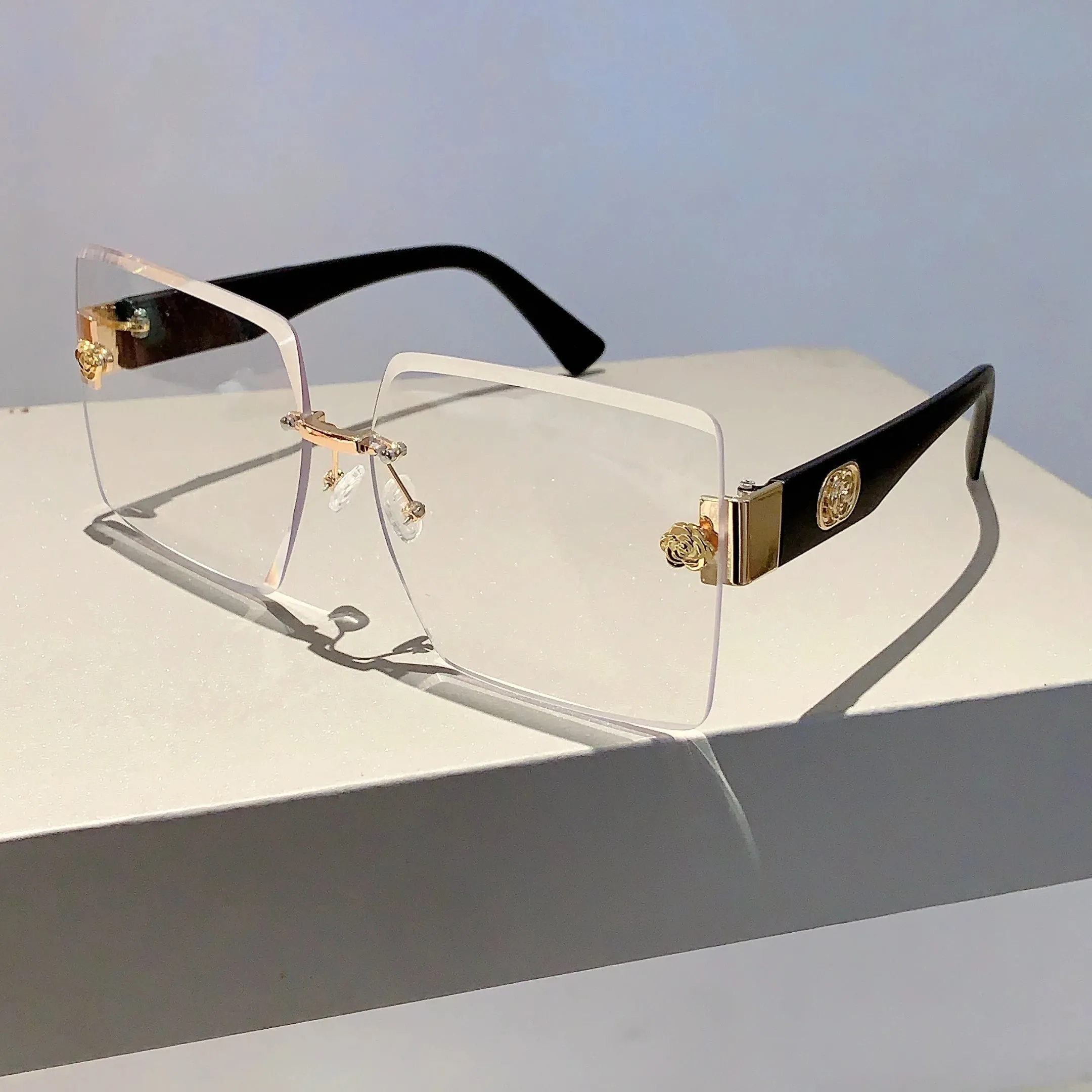 Sunset Glimmer Rimless Sunglasses