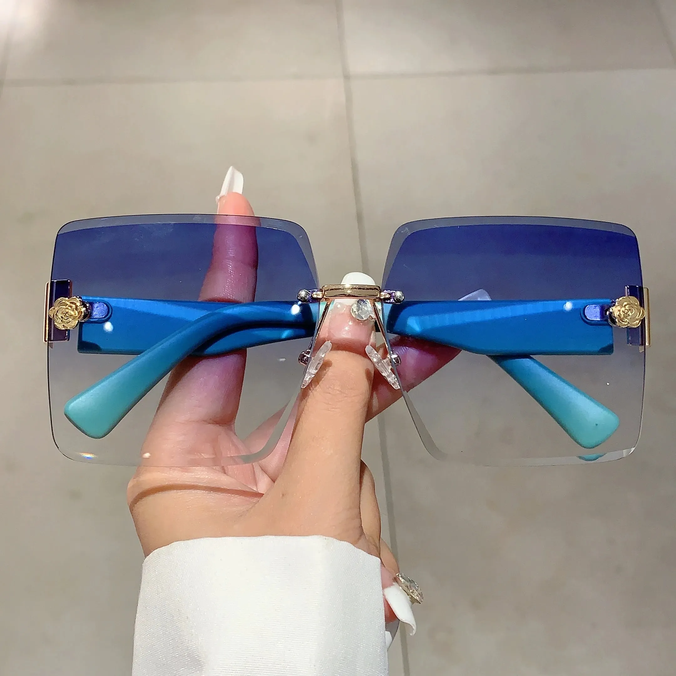 Sunset Glimmer Rimless Sunglasses