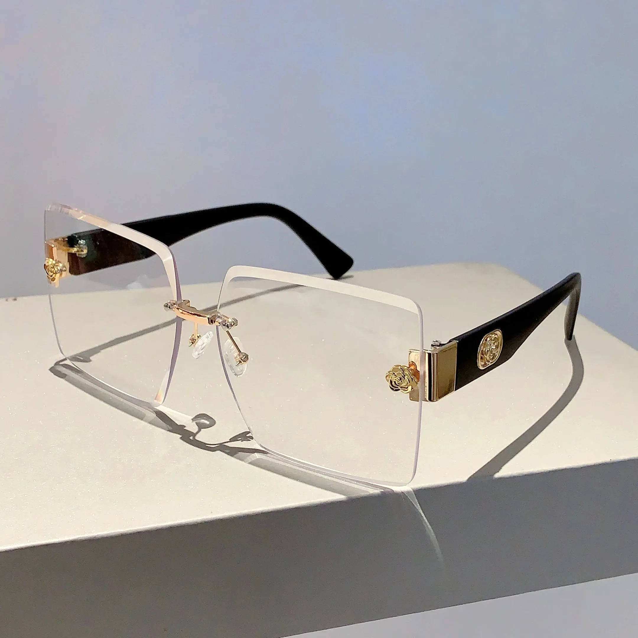 Sunset Glimmer Rimless Sunglasses